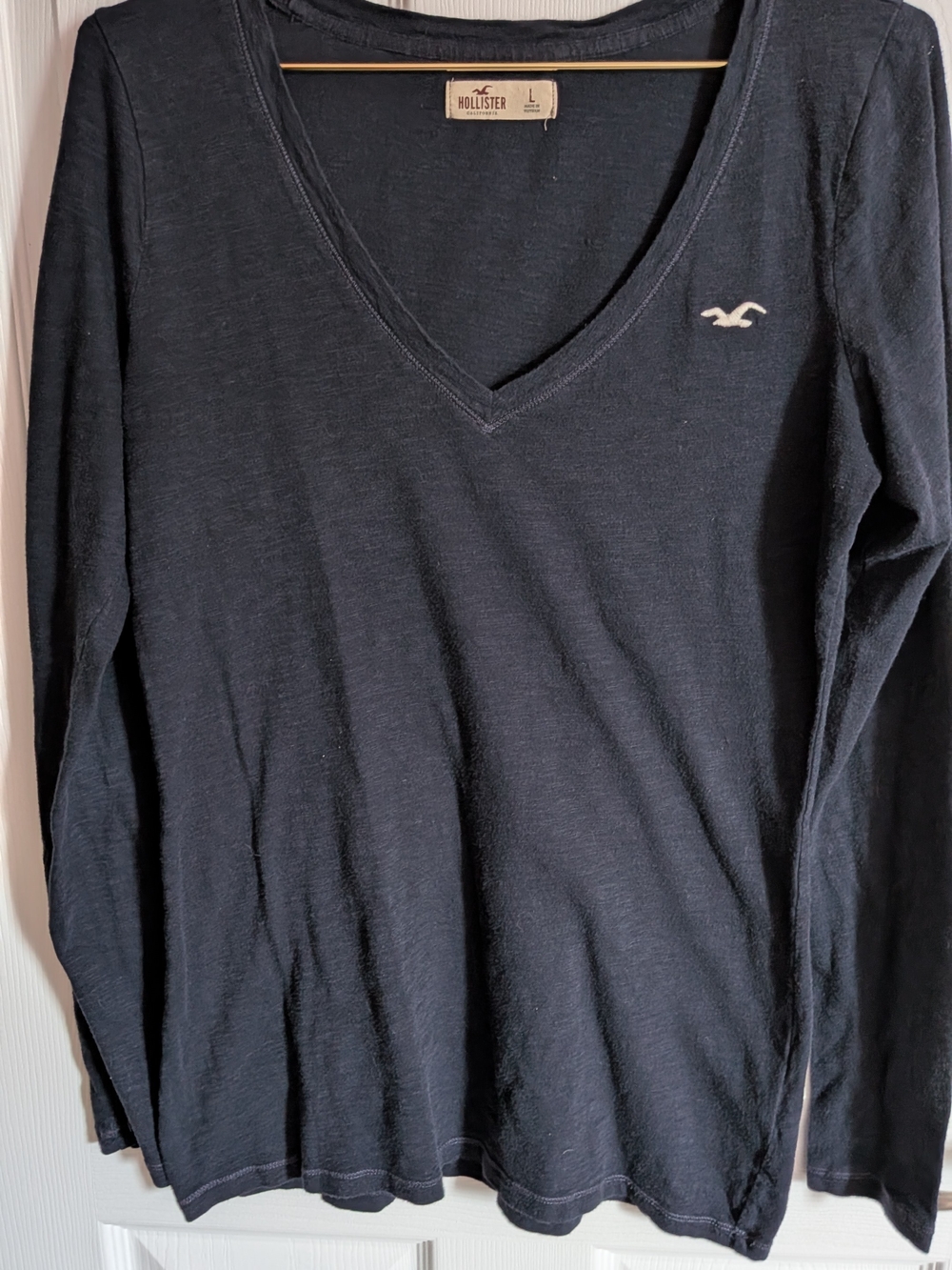 Hollister Women's Long Sleeve V-Neck Shirt in Black with White Logo